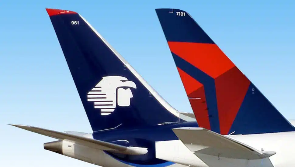 A Delta Airlines Plane next to an Aeromexico Plane.