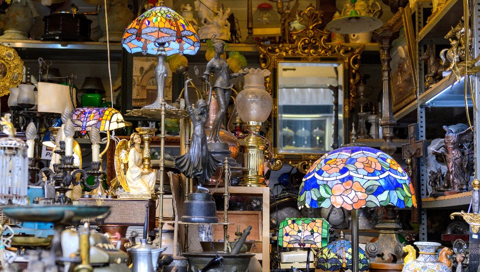 Various items for sale inside an antiques store.