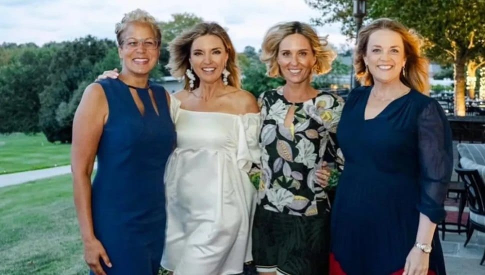 QVC's Jennifer Coffey stands with three of her friends.