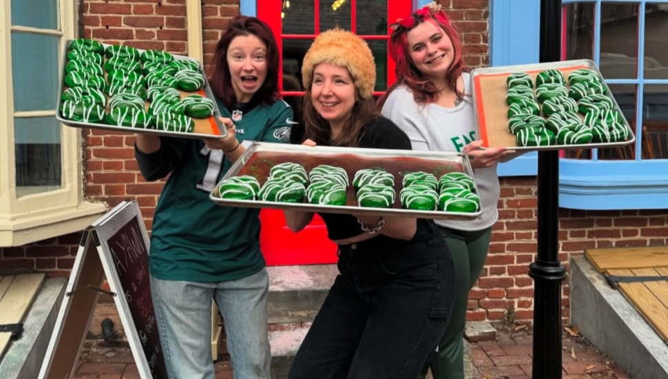 Loretta's Bakery and Cafe staff show off some of its Eagles-themed pastries.
