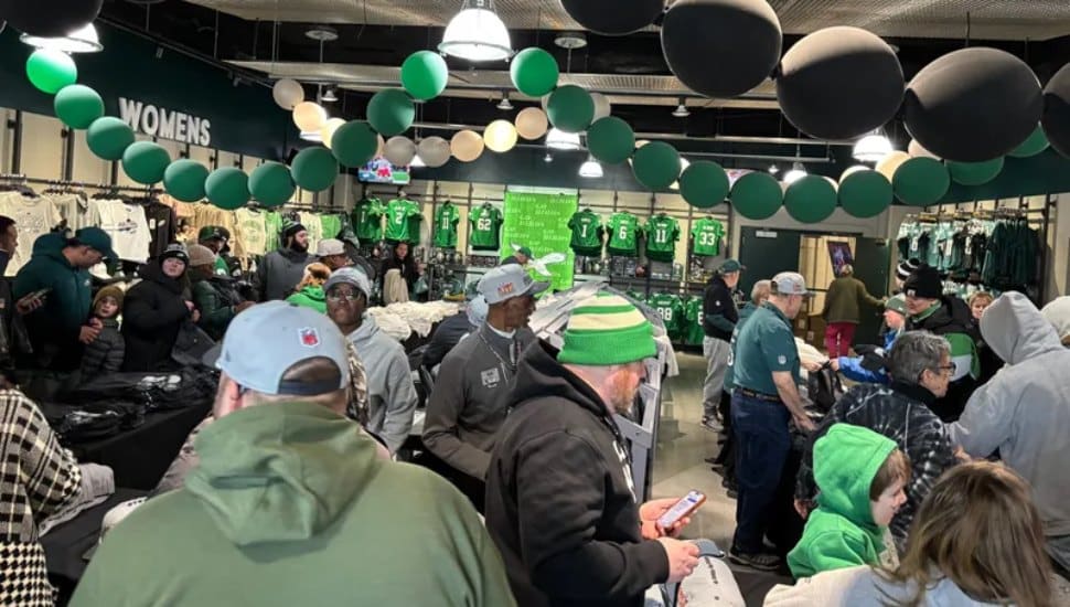 Fans crowded into the Eagles pro shop at Lincoln Financial Field to snatch up merchandise for the Eagles parade.