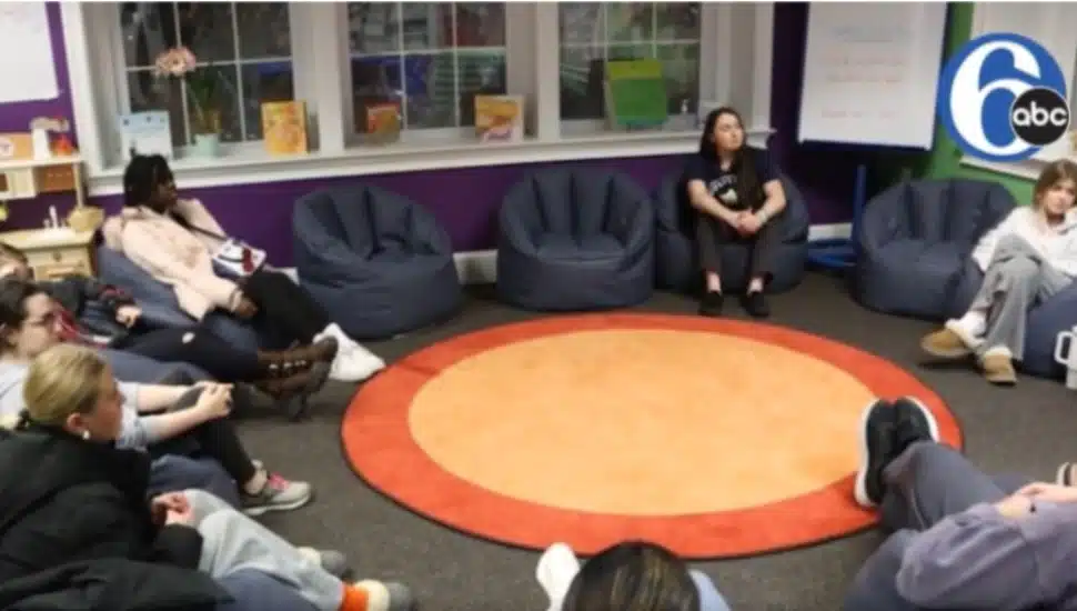 Young teens sit in a circle during a grief support group session at Peter's Place in Radnor.