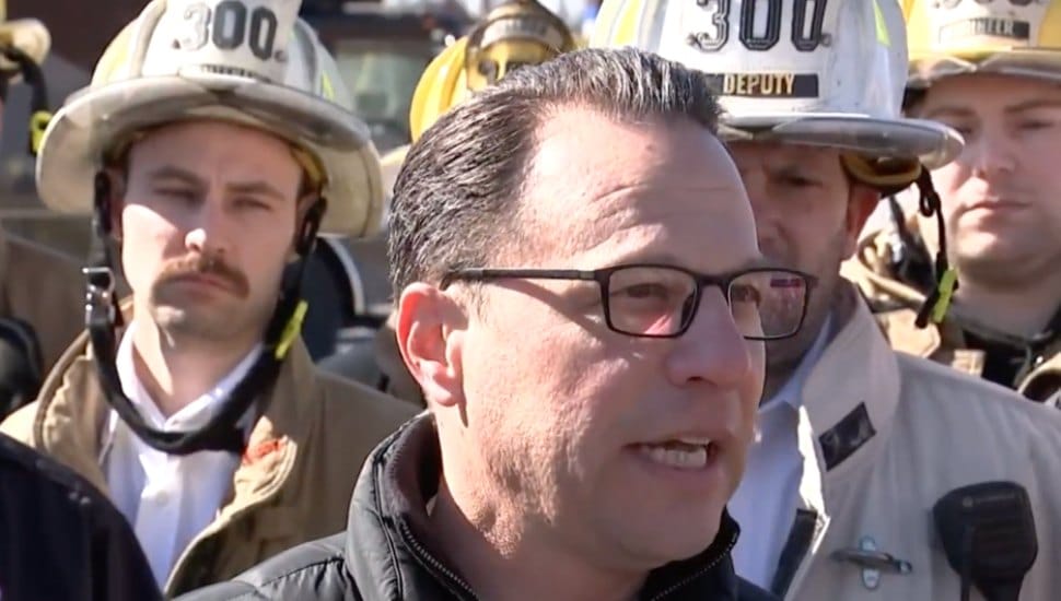 Pa. Gov. Josh Shapiro assesses the damage from the SPS fire.