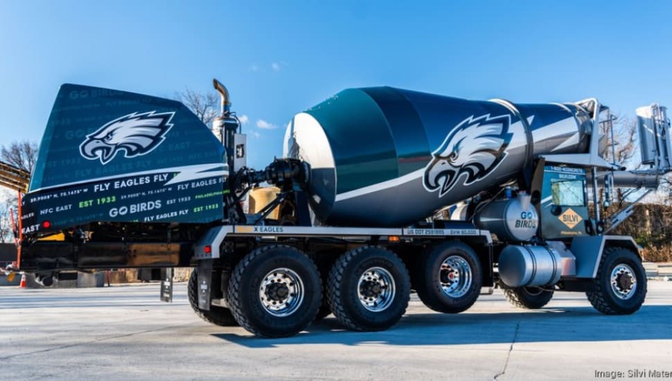Cement trucks with the Philadelphia Eagles logo and colors.
