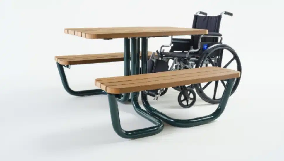 A picnic table with a wheelchair.