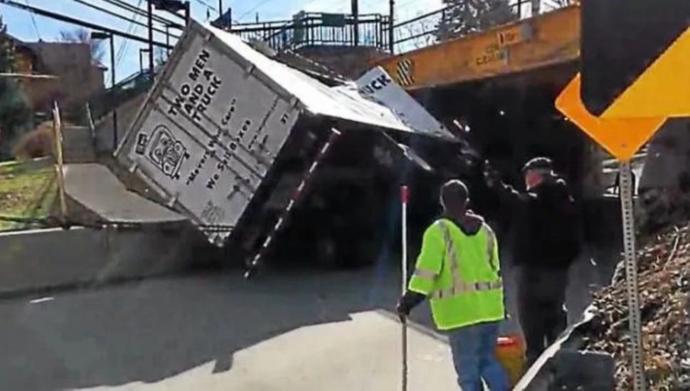 A truck collides with an Amtrak bridge above King of Prussia Road in Radnor.