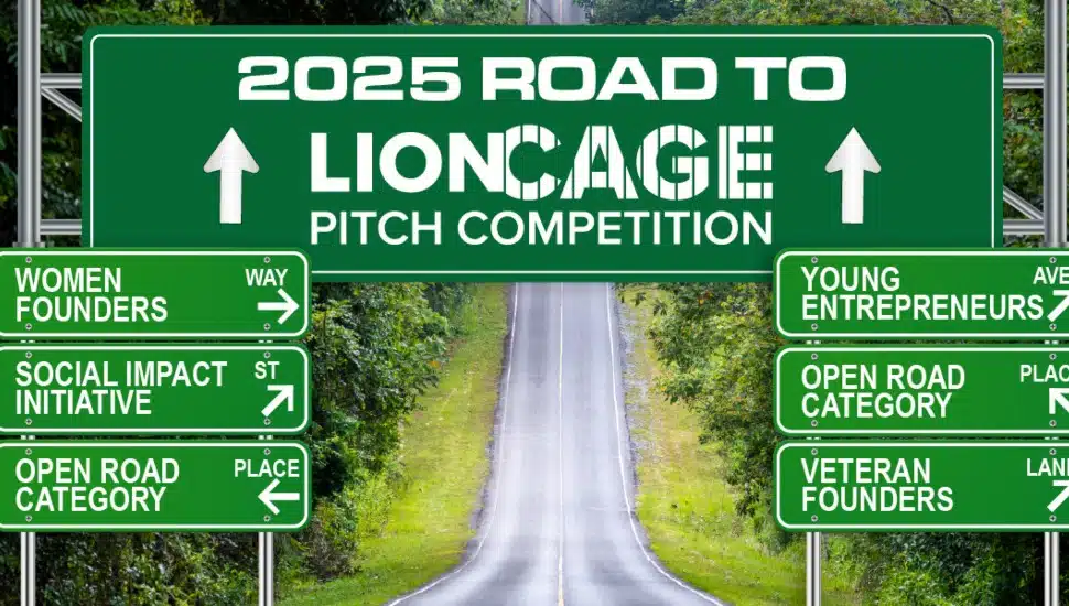 "2025 Road to LionCage Pitch Competition" sign on a highway with directional road signs for different competition categories, including Women Founders, Social Impact Initiative, Open Road Category, Young Entrepreneurs, and Veteran Founders. Green road signs with white text set against a scenic tree-lined road background.