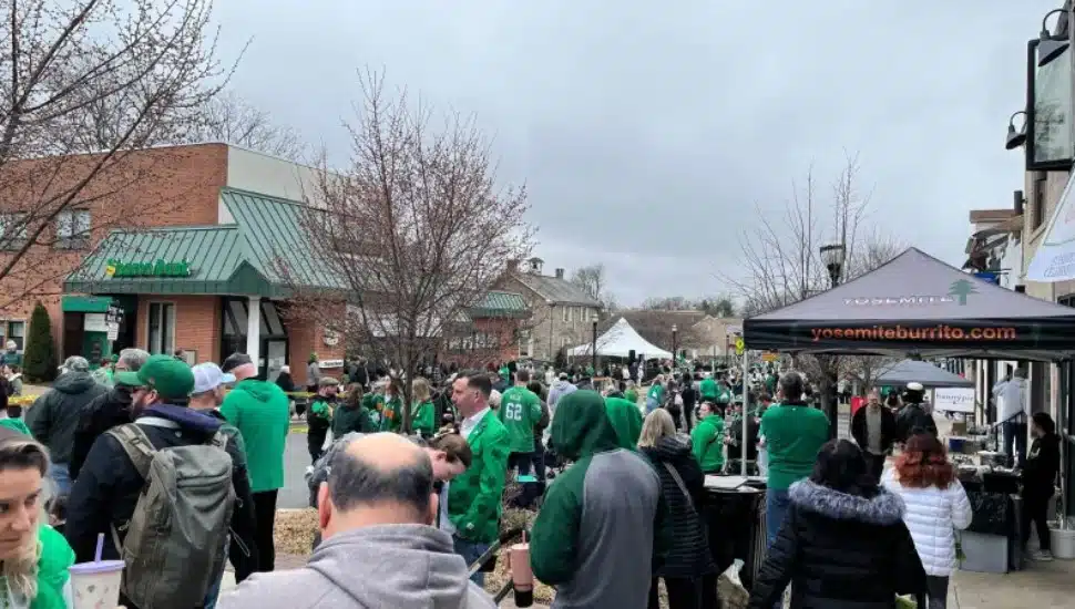 A crowd gathered on Saxer Ave to watch the St. Patrick's Day Parade.