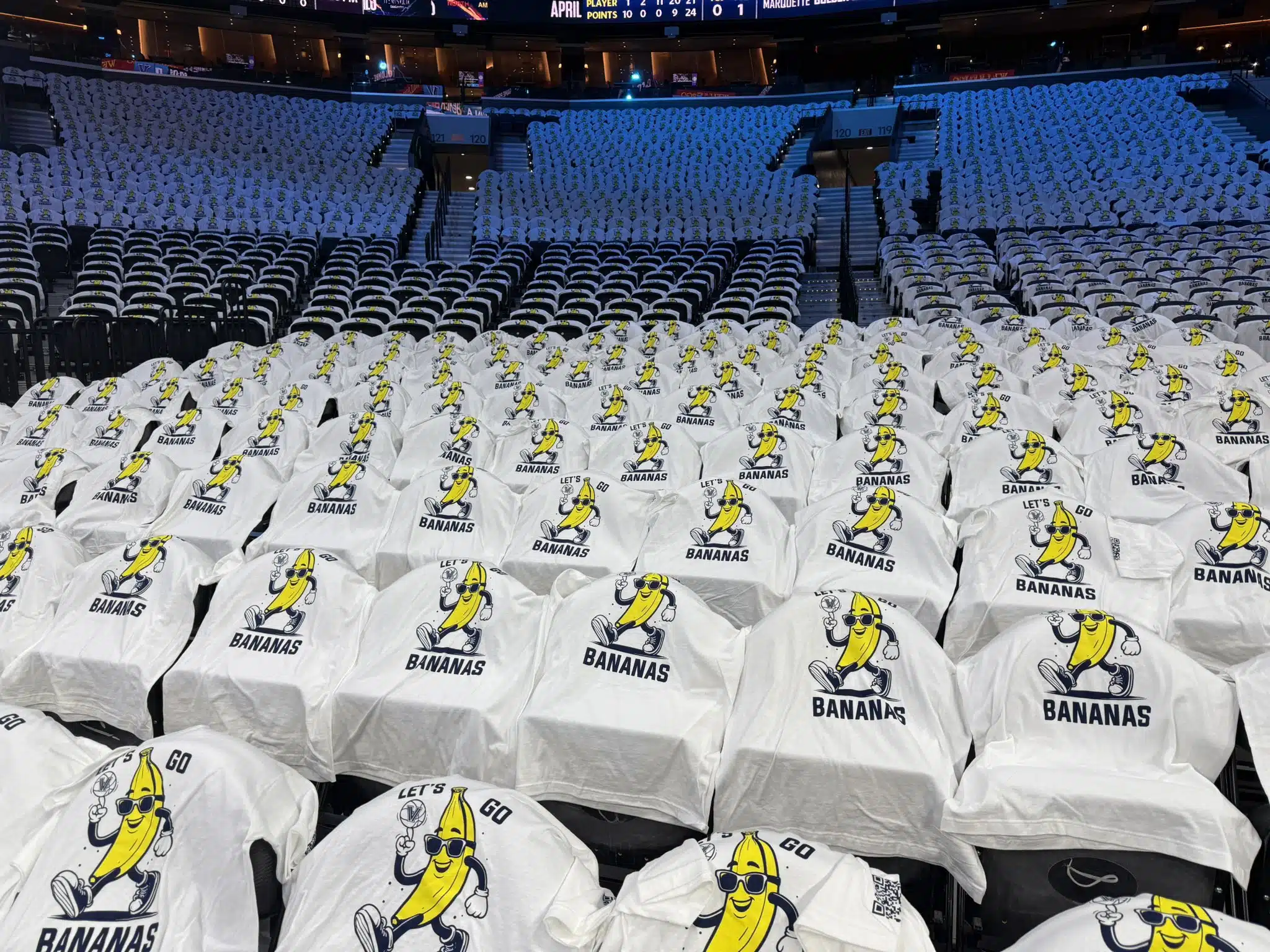 Reserved seating at a Wildcats game for Villanova fans in banana costumes.