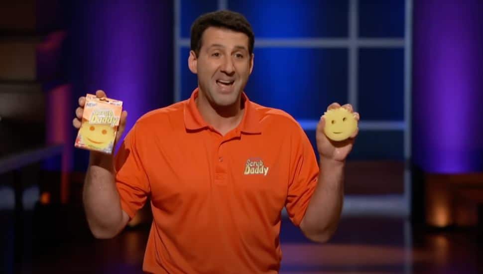 Aaron Krause holds up his famous Scrub Daddy products on Shark Tank.