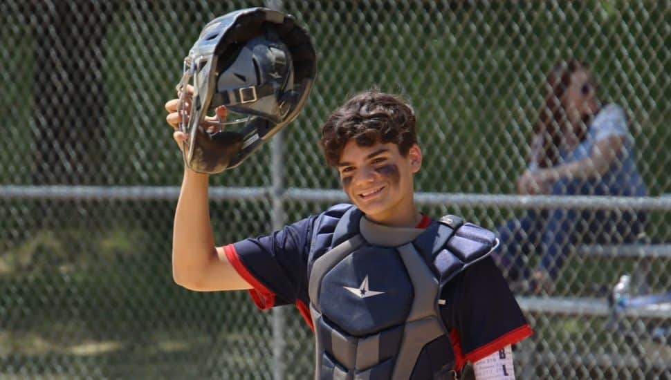 Jay Crater is seen here in a catcher's outfit.
