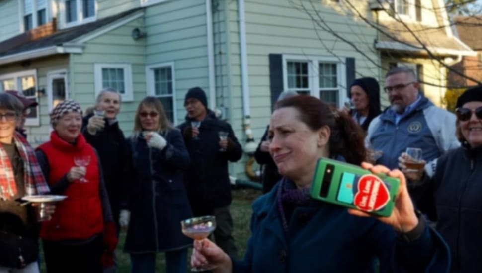 Neighbors in the Gladstone Manor of Lansdowne Borough gather for a weekly curbside Happy Hour.