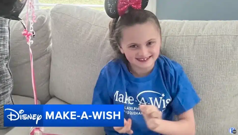 Grace Petitti wearing her Make-A-Wish Foundation shirt and Mickey Mouse Ears.