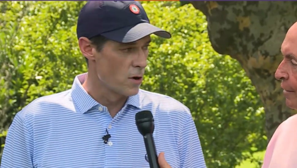 Mike McDermott is interviewed on the Llanerch golf course during a Llanerch Match for Charity event at the Llanerch Country Club in Havertown.