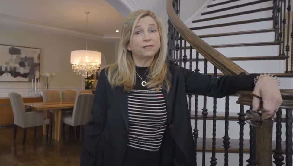 Robin Gordon of Robin Gordon Group stands inside a Wynnewood home that's receiving some exploding offers.