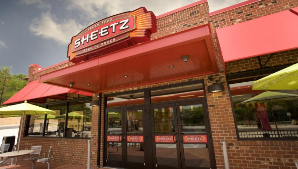 The entrance to a Sheetz convenience store with the sign above the front door.