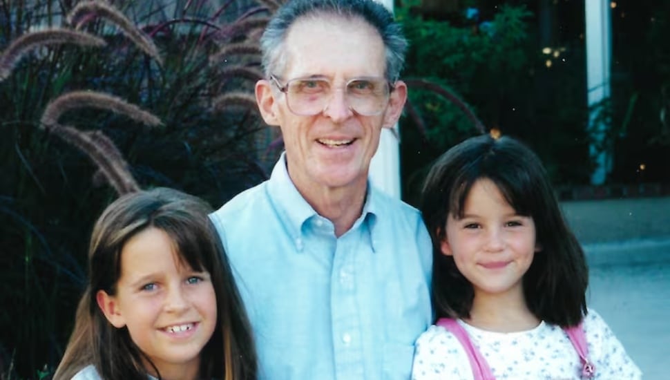 Ted Keyser with his two granddaughters.
