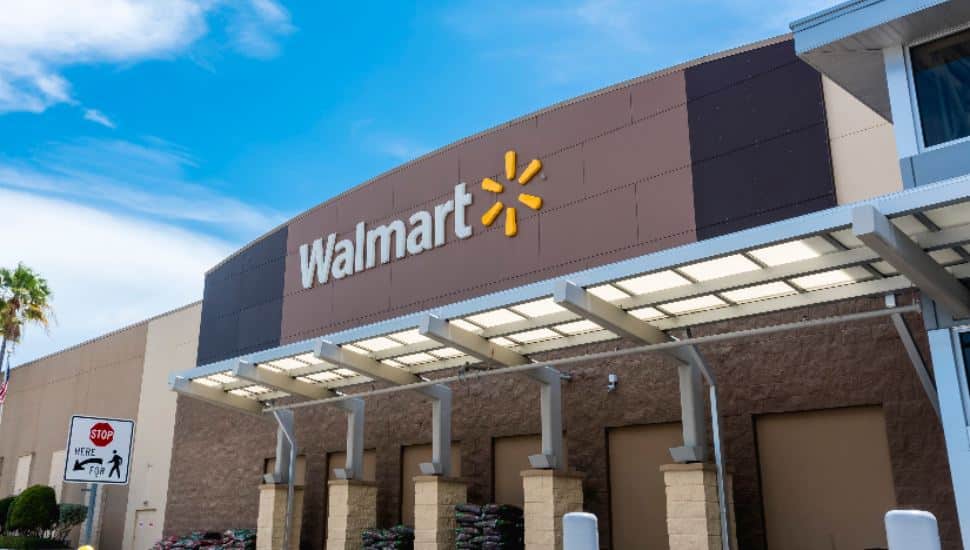 The outside of a Walmart store with its sign.