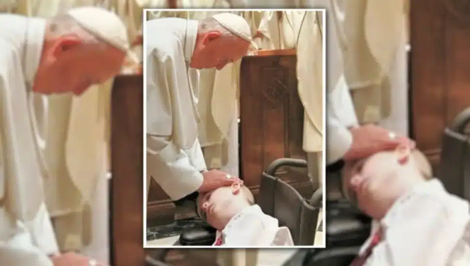 A multiple image of Pope Francis blessing Conall Harvey during a 2015 mass at the Cathedral of Saints Peter and Paul in Philadelphia.