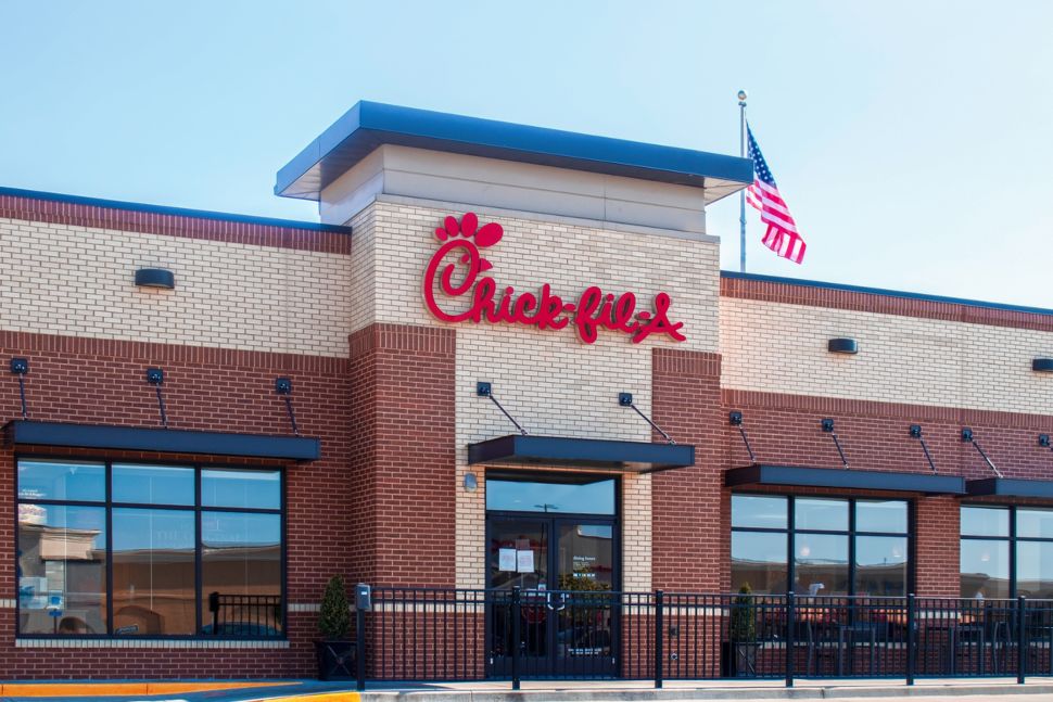 A Chick-fil-A store entrance and sign.
