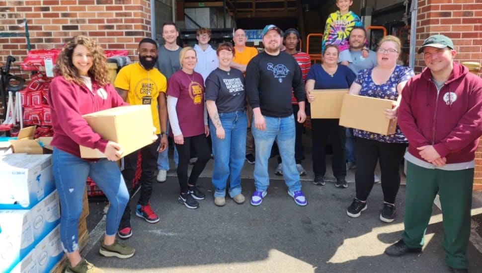 The team at Bulk Foods Delco in Collingdale prepare complimentary food packages for the laid off employees at Crozer-Chester Medical Center and Taylor Hospital.