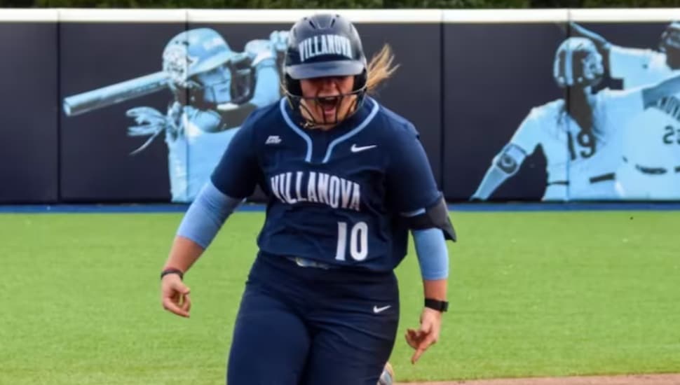 Ava Franz gives out a yell as she runs the bases.