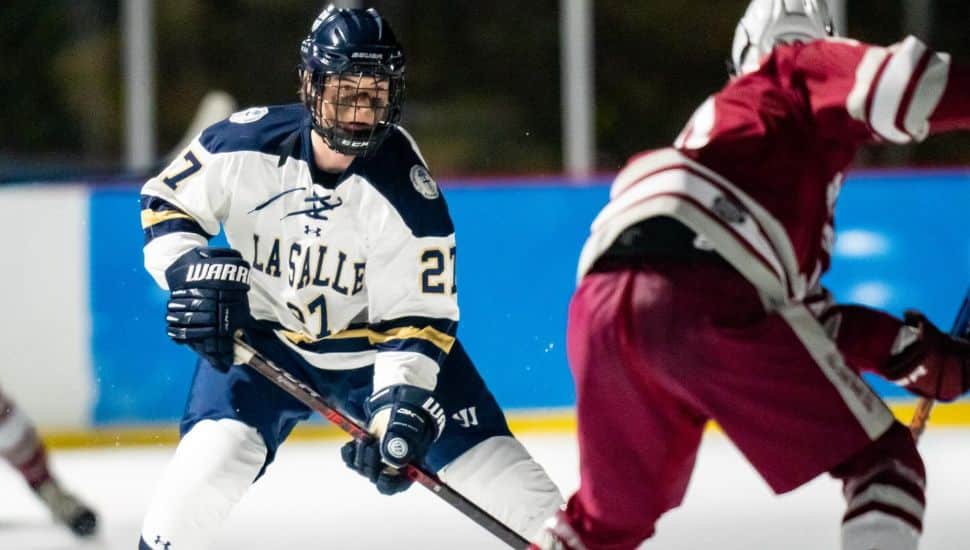 Lasalle College High School students play ice hockey.