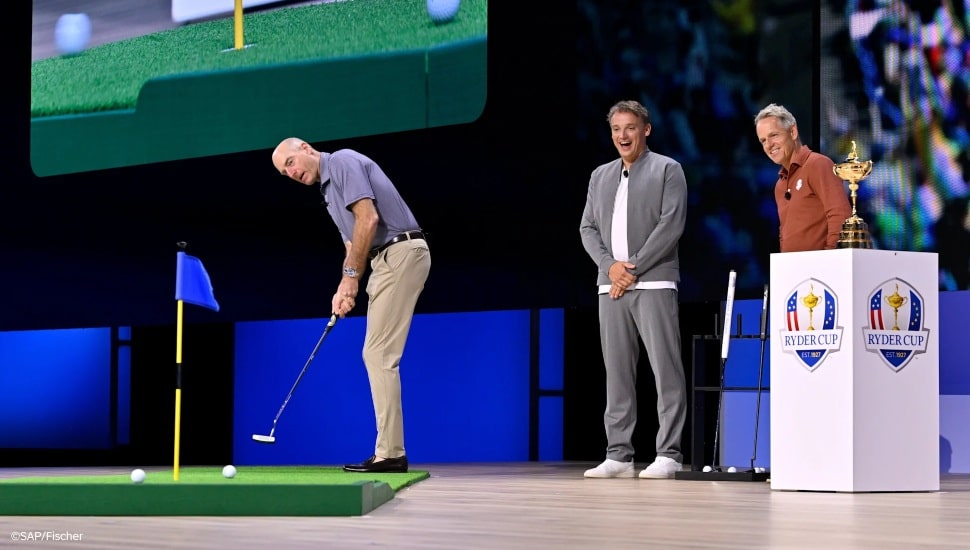 A golfer takes a putt at a Ryder Cup event.