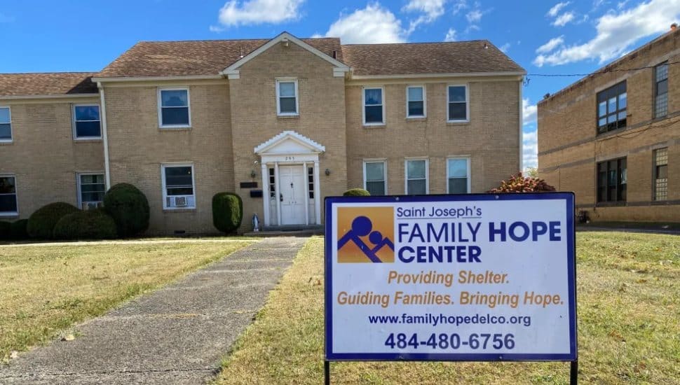 The sign and building for St. Joseph's Family Hope Center at Our Lady of Charity Catholic Church in Brookhaven.