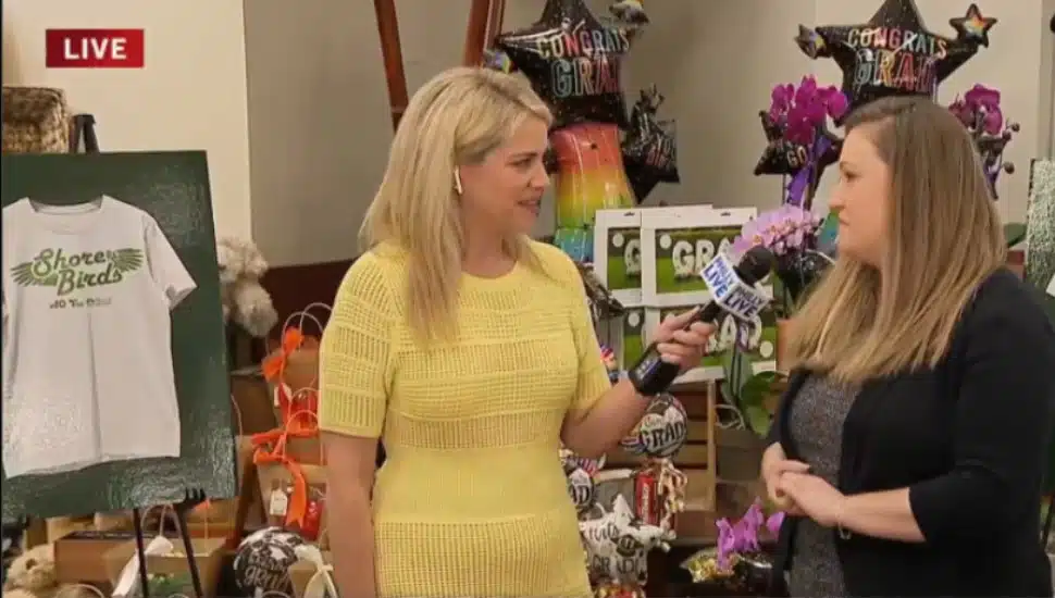 NBC 10’s Amy Fadool talks with Acme spokesperson Dana Ward. A Shore Birds T-shirt is in the background.