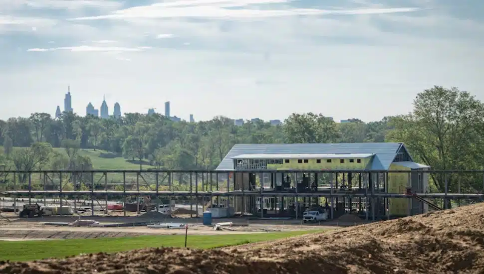 The Lincoln Financial Center at Cobbs Creek under construction in April will contain the tavern, driving range, and event space at the Cobbs Creek Golf Club.