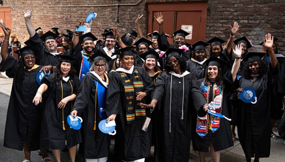 Peirce College graduates celebrating.