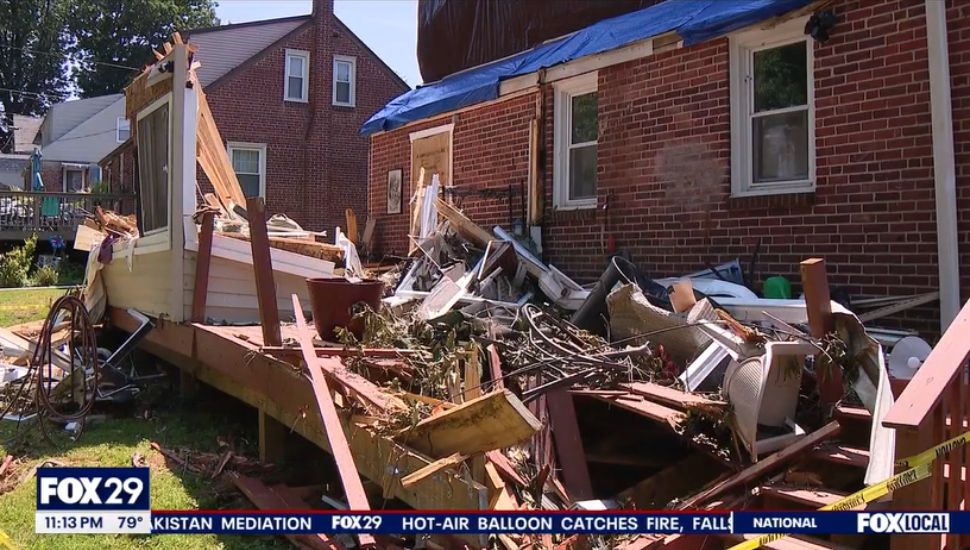 The debris left behind after a tree fell on a Drexel Hill home in a storm.