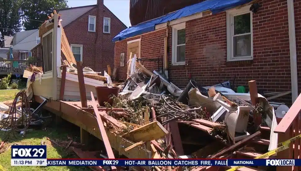 The debris left behind after a tree fell on a Drexel Hill home in a storm.