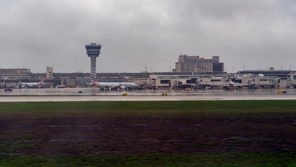 The air traffic control tower on a grey day at Philadelphia International Airport.