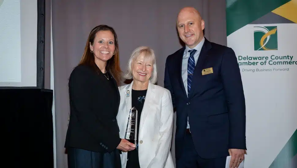 Foundation of Delaware County President Frances Sheehan (center) stands with Delaware County Chamber of Commerce President Trish McFarland and Grant Gegwich, immediate past chairman of the Chamber Board of Directors.