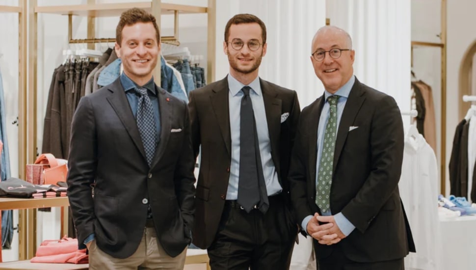 Three men in business suits at Boyd's.