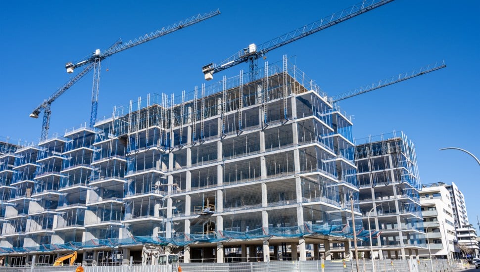 The frame of buildings under construction.