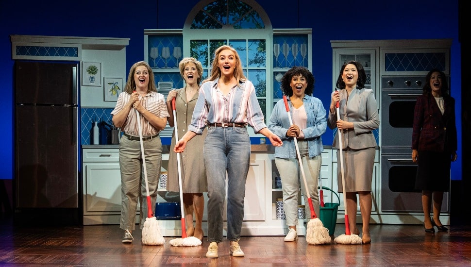 Performers feature the Miracle Mop in Joy, a QVC musical.