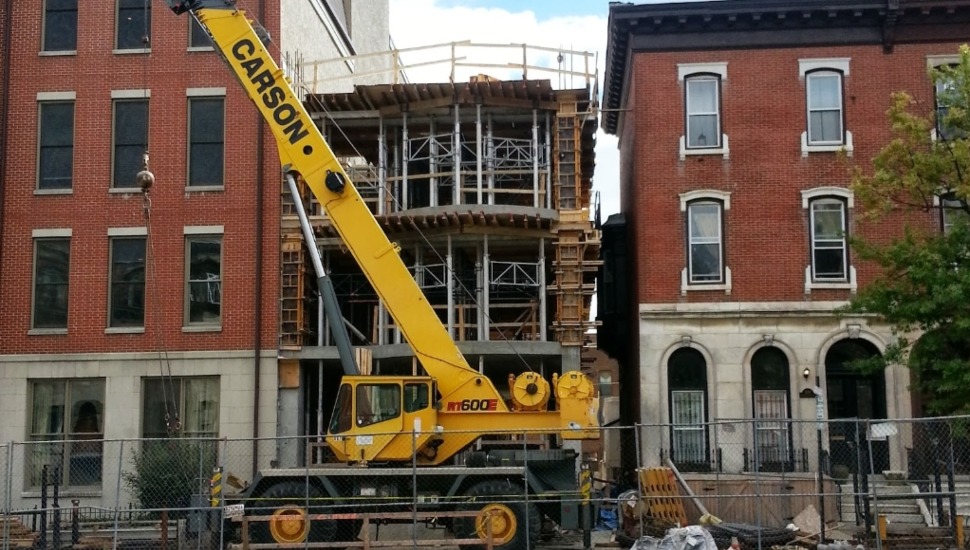 A crane outside a luxury apartment being built in Spring Garden.