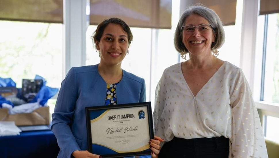 Nasibeh Zohrabi (left) was given the Open Champions Award by Jennifer Nesbitt (right), chief academic officer at Penn State Brandywine.