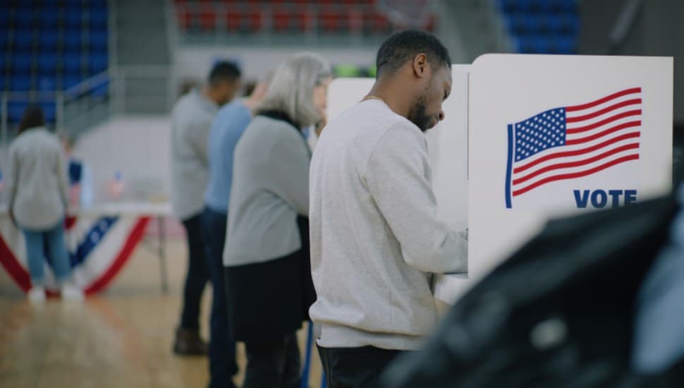 People voting at a polling location.