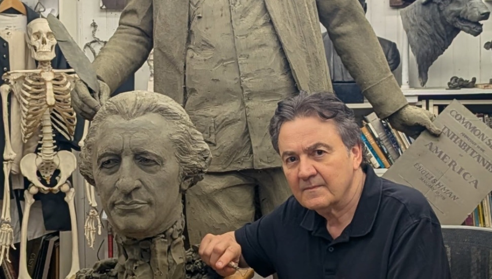 Sculptor Zenos Frudakis with one of his sculptures.