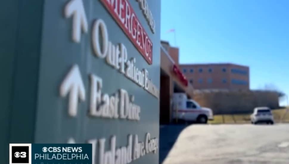 A sign for emergency services at a Crozer Health hospital.