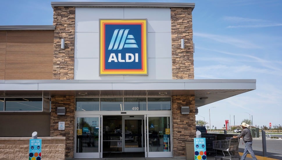 An Aldi store with the Aldi sign on the building.