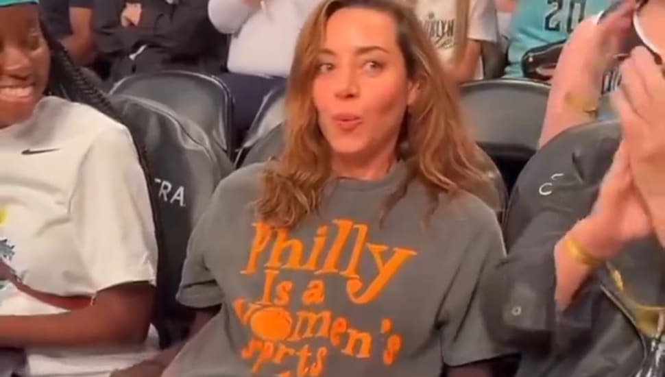 Aubrey Plaza was seen at the recent New York Liberty vs. Minnesota Lynx game wearing a T-shirt that reads, "Philly is a women's sports town."