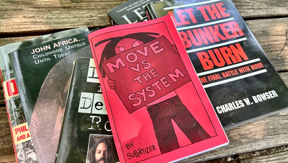 An assembled collection of books about MOVE.