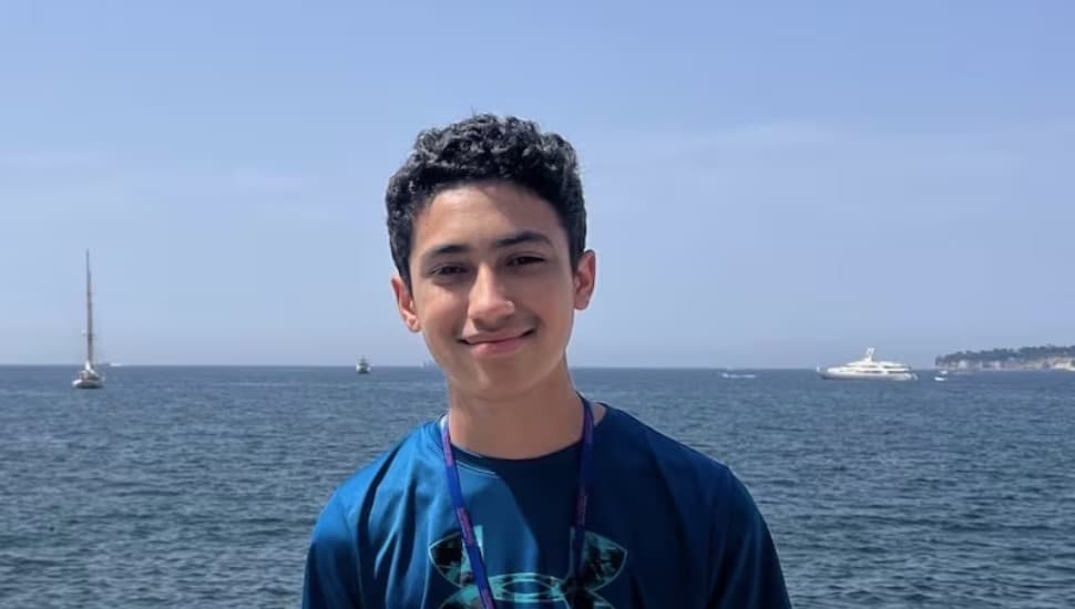 Phillip Diaz with a body of water behind him.
