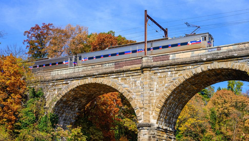 A SEPTA train crosses a bridge.