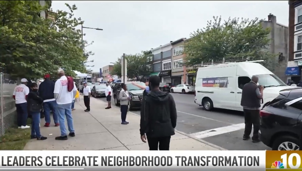 A street view with people of a West Philadelphia block.